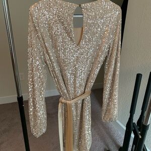 Dress Forum gold sequin party dress.